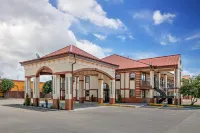 Quality Inn & Suites Hotels near County Line Holiness Church