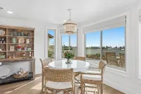 Enjoy the Sunset and Ocean Views in this Designer Vacation Home with Privacy.