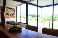 Charming 1-Bedroom Apartment in Río Lagartos. AC, Rooftop Deck & Private Pier -J Hotels in Rio Lagartos