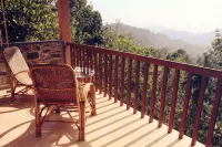 Oxygen Resorts Thekkady - Bergblick