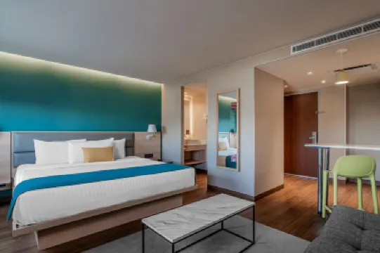 City Express Suites by Marriott Querétaro Отели в г. 