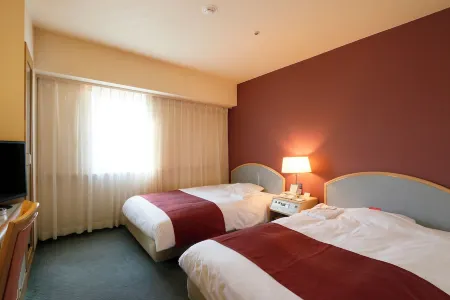 Nest Hotel Matsuyama Отели рядом с достопримечательностью «Bocchan Wind up Clock»