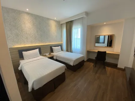 Matos Hotel Mamuju Отели в г. Мамаджу