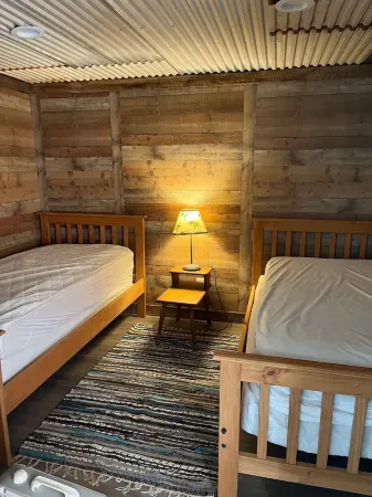 A Minimalist Fancy!  A cute place to lay your head and take a short shower.