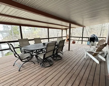 Updated 3 bedroom lakefront home offers privacy and comfort w dock on Grand Lake