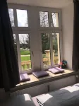 Vacation apartment with balcony overlooking the spa gardens of Bad Rothenfelde