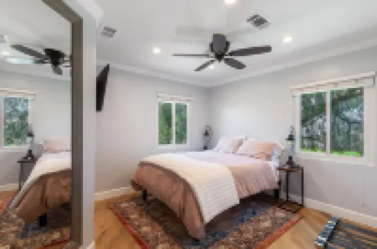 A private oasis to relax and play in the comfort of a gated 2-acre estate.