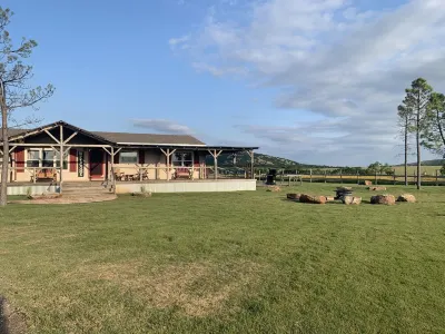 Mountain views, wrap around porch, incredible lawn with fire pit!!