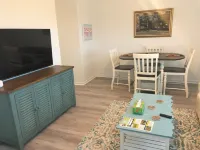 Very stylish and modern first-floor 2-bedroom unit with ocean views galore!