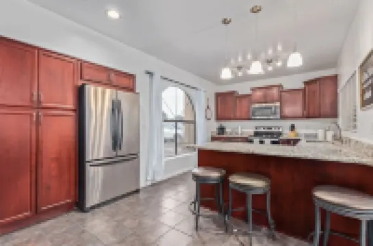 Your Home Away! Offering Free Heated Pool ! Close to Almost Everything!