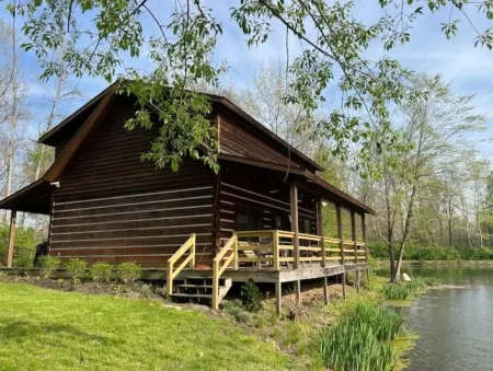 Unique Log Cabin Retreat on 138 Acres, swim, fish, boat, paddleboard, kayak!