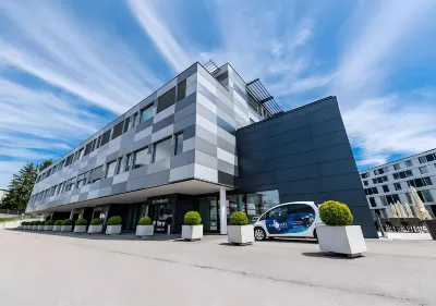 ディスカバリー ホテル ロレックス・ラーニングセンター周辺のホテル