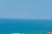 Chic Urban Getaway with Balcony & Mamad by Sea N Rent