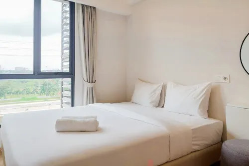 Nice and Elegant 2Br at Sky House BSD Apartment