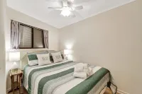 Ocean View Balcony and Community Pool - Charming Island Escape