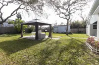 Spacious Fenced Backyard and Cozy Living Area - Charming Escape