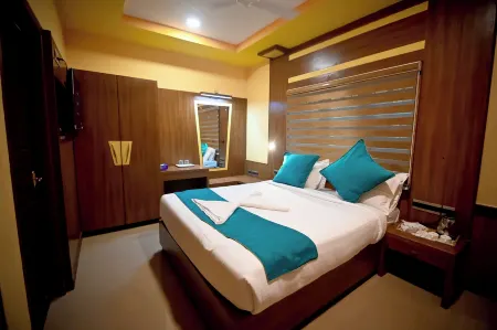 Benzy Palace Resort Отели рядом с достопримечательностью «Shri Murdeshwara Beach»