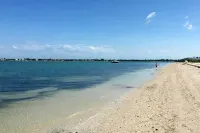 Waterfront Pink House with Private Dock & Pool - Beach