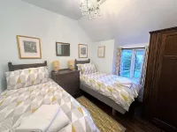 Roseleigh Cottage in the heart of Stow-on-the-Wold with parking for 2 cars.
