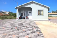 Safe gated community 5 minutes from beach and famous attractions. Hotels near Green Grotto Caves