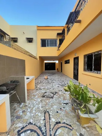 In Saly on the small coast house of 450 m2, with 5 bedrooms and private pool Отели в г. Сали