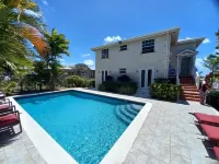 Roomy Lower 3 Bedroom West Coast Property with Pool Hotels in Mount Standfast