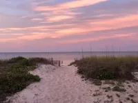 Book your getaway now! Relax on the screened porch looking out over the Bay!