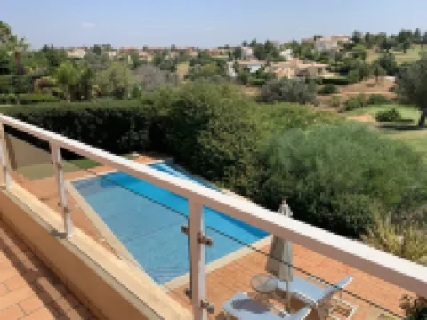 Large private detached three bedroom villa with heated infinity swimming pool
