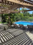 Wooden villa with private pool in a tropical garden 3 minutes from the beach - วิลล่า