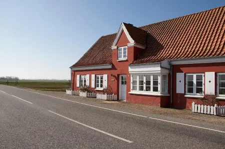 Rudbøl Grænsekro Отели в г. Hojer