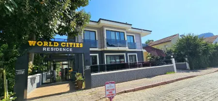 World Cities Residence Отели рядом с достопримечательностью «Çekirdeksiz Mandalin Camping Kemer Antalya Çadır Karavan Kamp Alanı»