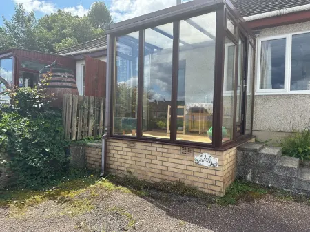 Family Cottage by the Crinan Canal, handy for whisky, golf and standing stones.