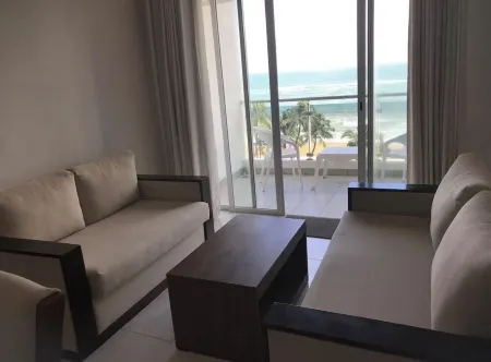 Enjoy a beautiful sunset from your ocean-view bedroom.