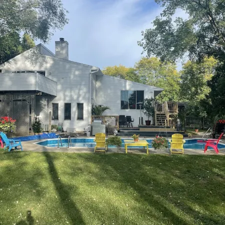 Contemporary home in quiet neighborhood with pool & great back yard close to all
