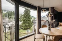 The Post Apartments Hotels in Dobbiaco