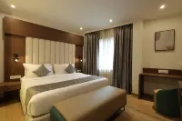 Grand Plaza Inn by RAK Rooms Kannur - breakfast