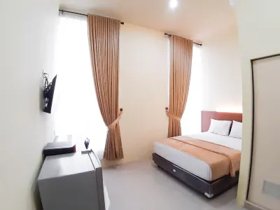 RedDoorz Syariah Near Transmart Jambi 2 Hôtels à : 