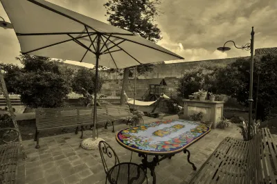 Il giardino in centro città Hotel in zona Monastero dei Benedettini di San Nicolò l'Arena