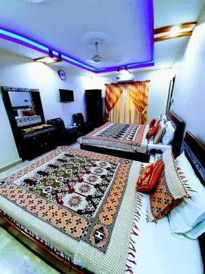 Galaxy Inn Guest House Hotels near Dolmen Mall Tariq Road