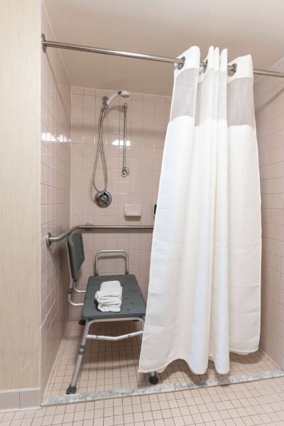 Mobility Accessible One Bedroom Suite Queen Roll-In Shower