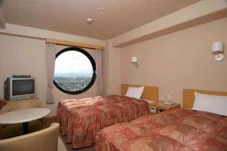 Hotel Peaceful Отели рядом с достопримечательностью «Kumamoto Airport Observation Deck»