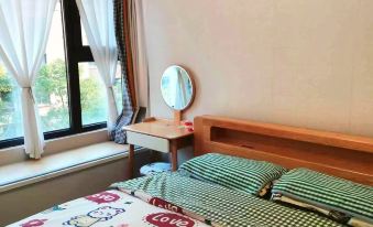 Muzi Jiajia Apartment (Haining Road No.1)