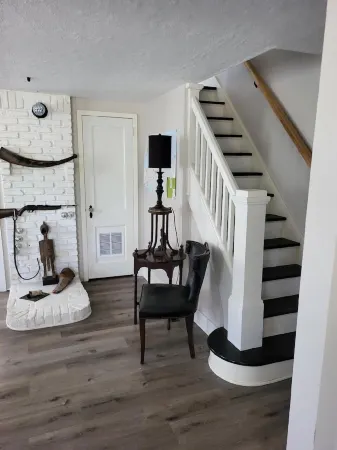 Charming Riverhead home with large outdoor patio & backyard  firepit