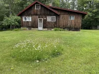 Vintage 1920s Speakeasy Cabin Overlooking the Sandy Shores of Swan Lake!
