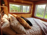 Near Pictured Rocks and trails, On the Au Train River, has private hot tub