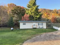 Country home-just steps from Coon Creek and a short drive to Mississippi River