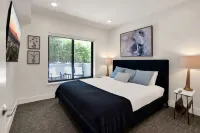 Pets Stay Free • Private Terrace • Elevator • King Beds • In-Unit W/D