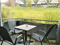 Near the beach, modern ground floor apartment with balcony, free Wi-Fi Hotel a Horumersiel