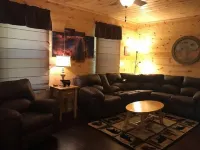 4BR 2 bath house with full kitchen, living room, hot tub and game room.