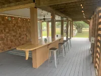 4X4 only! Canal front. Ocean AND sound views! Decks and porches on all levels.